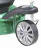 Close-up of the wheel and part of the body of a green lawnmower. Produktbild-Vorschau