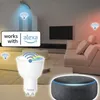 A living room scene with a smart light bulb and a smart speaker, demonstrating compatibility with Alexa. Anteprima dell’immagine prodotto