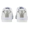 A pair of white Puma sneakers with silver accents on the heel, shown from the back. Podgląd zdjęcia produktu