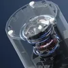 Close-up, transparent view of a powerful motor and fan system inside a device, possibly a vacuum cleaner or blender, with glowing blue and red accents suggesting operation. Produktbild-Vorschau