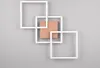 Three white square frames are arranged in a staggered pattern, with a brown square object placed in the center of the arrangement. Anteprima dell’immagine prodotto