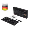 A black Perixx PERIBOARD-732B DE mini keyboard is displayed alongside its packaging and a manual, with a "Perixx designed in Germany" badge. Anteprima dell’immagine prodotto