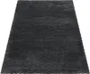 A dark gray shaggy rug is shown from a slightly elevated angle on a white background. Produktbild-Vorschau