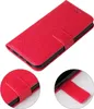 A red floral embossed flip cover case for a Samsung Galaxy S10 phone, shown from multiple angles. Produktbild-Vorschau