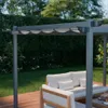A modern outdoor living space with a pergola, sofa, and wooden deck. Produktbild-Vorschau