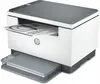 A white and gray HP LaserJet MFP M234dw printer is shown from a slightly elevated front-left angle, with a document partially fed into the output tray. Podgląd zdjęcia produktu