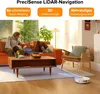 A couple relaxing on a couch in a living room, with a robot vacuum cleaner in the foreground. Produktbild-Vorschau