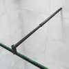 A close-up view of a shower screen support bar attached to a tiled wall. Produktbild-Vorschau