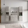 A modern bathroom vanity set with sink, mirror, and cabinets. Anteprima dell’immagine prodotto