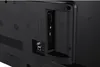 Close-up view of the rear ports of a television. Voir les images du produit