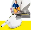 A woman is using a steam cleaner to clean a floor, with a close-up of the steam cleaner in the foreground. Voir les images du produit