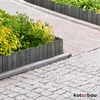 A garden path with a wooden border and plants. Náhled obrázku produktu