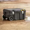 A black rolling tool chest sits on a wet, muddy surface. Anteprima dell’immagine prodotto