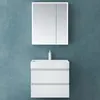 A white bathroom vanity with a mirror cabinet above it, set against a blue textured wall. Produktbild-Vorschau