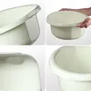 A collage of four close-up images of a cream-colored plastic basin, showing different angles and details. Voir les images du produit