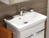 A bathroom sink with a cabinet underneath, a faucet, and a towel. Produktbild-Vorschau