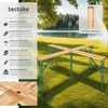 A picnic table set up outdoors by a lake, with text overlays describing its features. Produktbild-Vorschau