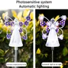 Two images of an angel-shaped solar garden light, one showing it charging during the day and the other showing it lit up at night. Náhľad obrázku produktu