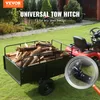 A lawn tractor is towing a trailer filled with firewood, with a close-up view of the hitch mechanism. Produktbild-Vorschau