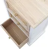 A close-up view of a white dresser with natural wood accents and a cane weave on the drawer fronts. One drawer is partially open, revealing the wooden interior. Anteprima dell’immagine prodotto