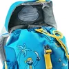Close-up view of the inside and top of a child's backpack. Náhled obrázku produktu