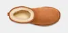 A top-down view of a single Ugg boot on a light gray background. Voir les images du produit