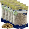 A group of five bags of pet food, with some food spilled in front. Produktbild-Vorschau