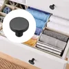 A drawer organizer with folded clothes. Produktbild-Vorschau
