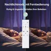Two children sleeping in beds, with a remote control in the foreground and text overlays. Produktbild-Vorschau