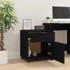 A black mobile filing cabinet with an open drawer and door, placed next to a potted plant and a desk with a computer monitor. Voir les images du produit