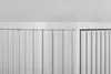 A close-up view of the top section of a white cabinet with vertical slats. Anteprima dell’immagine prodotto