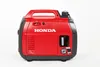 A red Honda generator is shown against a white background. Produktbild-Vorschau