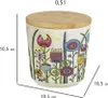 A decorative storage container with a bamboo lid, featuring a colorful floral design. Produktbild-Vorschau