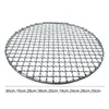 A round metal grill grate is shown against a white background. Produktbild-Vorschau