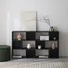 A black bookshelf with various decorative items and books on display, next to a green ottoman. Anteprima dell’immagine prodotto