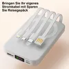 A white power bank with integrated charging cables is shown on a light beige background. Produktbild-Vorschau