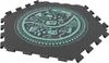 A circular play mat with a road and various scenes printed on it, designed for children's play. Produktbild-Vorschau