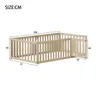 A diagram showing the dimensions of a wooden crib or playpen. Produktbild-Vorschau