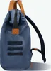 A close-up side view of a blue backpack with brown leather accents. Voir les images du produit