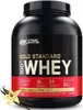 A black and red tub of Optimum Nutrition Gold Standard 100% Whey protein powder, with a vanilla flower and pods in the foreground. Produktbild-Vorschau