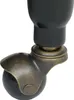 A close-up of a caster wheel on a black object. Anteprima dell’immagine prodotto