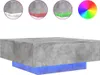 A concrete coffee table with a blue base, shown with examples of LED light colors. Voir les images du produit