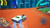 A racing game scene with a white car on an orange track. Produktbild-Vorschau