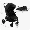 A black baby stroller is shown in two states: unfolded with dimensions indicated, and folded with dimensions indicated. Náhľad obrázku produktu