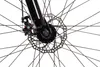 A close-up view of a bicycle's front wheel hub and disc brake. Náhľad obrázku produktu