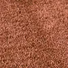 A close-up view of a brown carpet. Produktbild-Vorschau