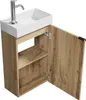 A compact bathroom vanity set with a sink and cabinet, shown against a white background. Voir les images du produit
