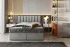 A bedroom scene featuring a bed, nightstands, and a desk area with shelves. Voir les images du produit