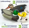 A set of realistic plastic duck decoys and ducklings, with accompanying nylon band, presented on a white background with German text labels. Produktbild-Vorschau