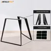 Two black metal table legs are displayed against a white background. Inset images show close-ups of mounting holes and protective felt pads. Náhľad obrázku produktu